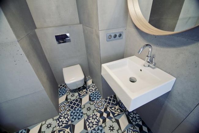 Ванная комната с архитектурным бетоном на стенах