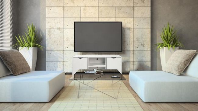 Телевизор в небольшой гостиной может быть подсвечен сзади