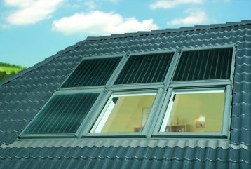 солнечные коллекторы и окна на крыше